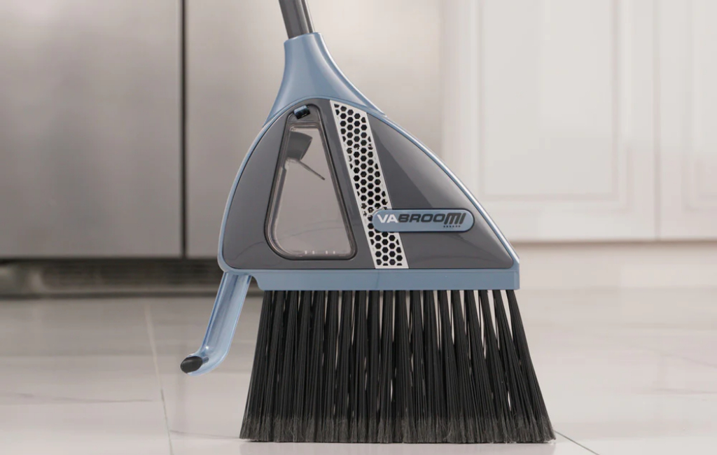 Broom with vacuum