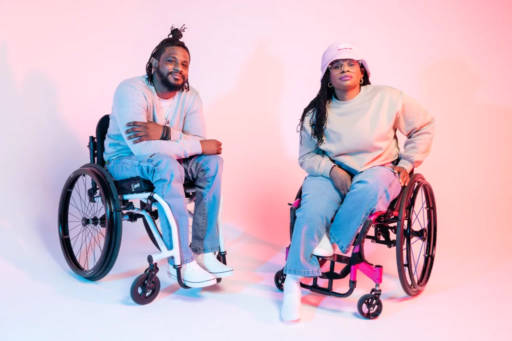 pair in a wheelchair