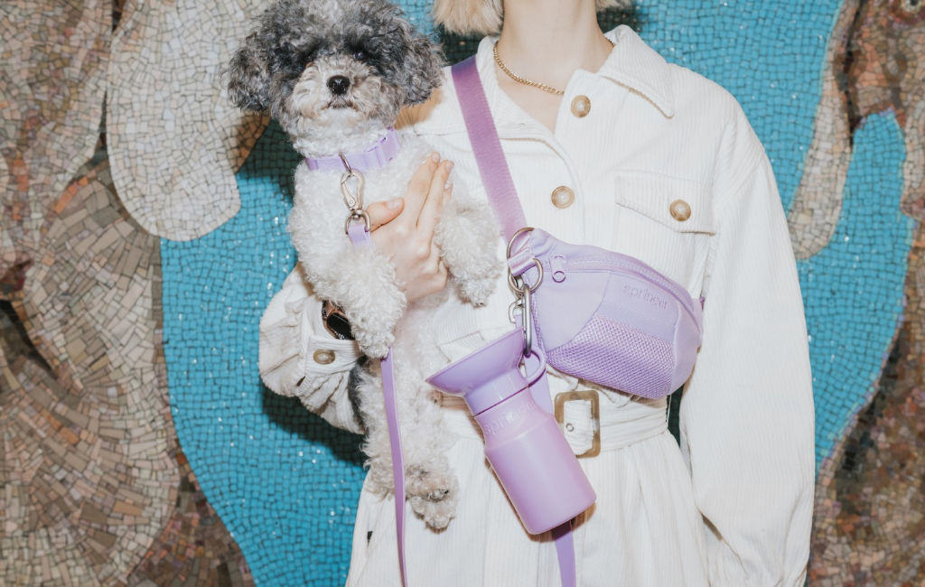 woman holding dog