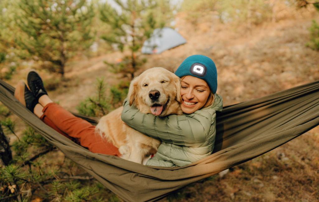 women holding dog