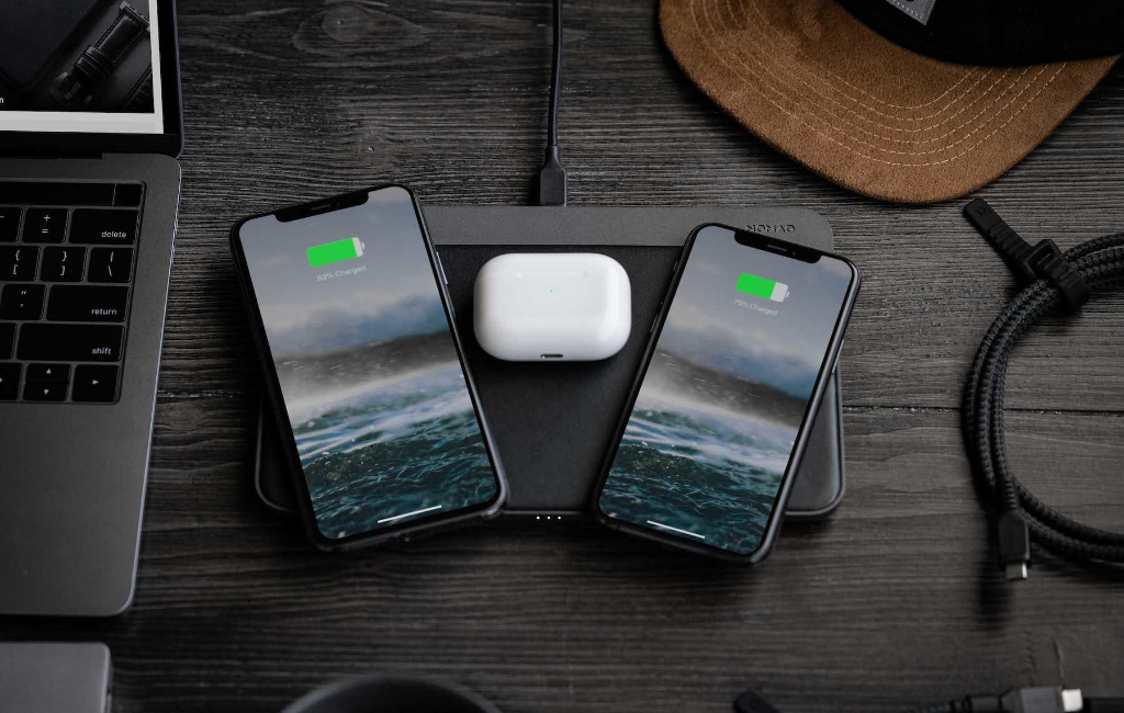 charging phones and airpod with nomad wireless charging pad