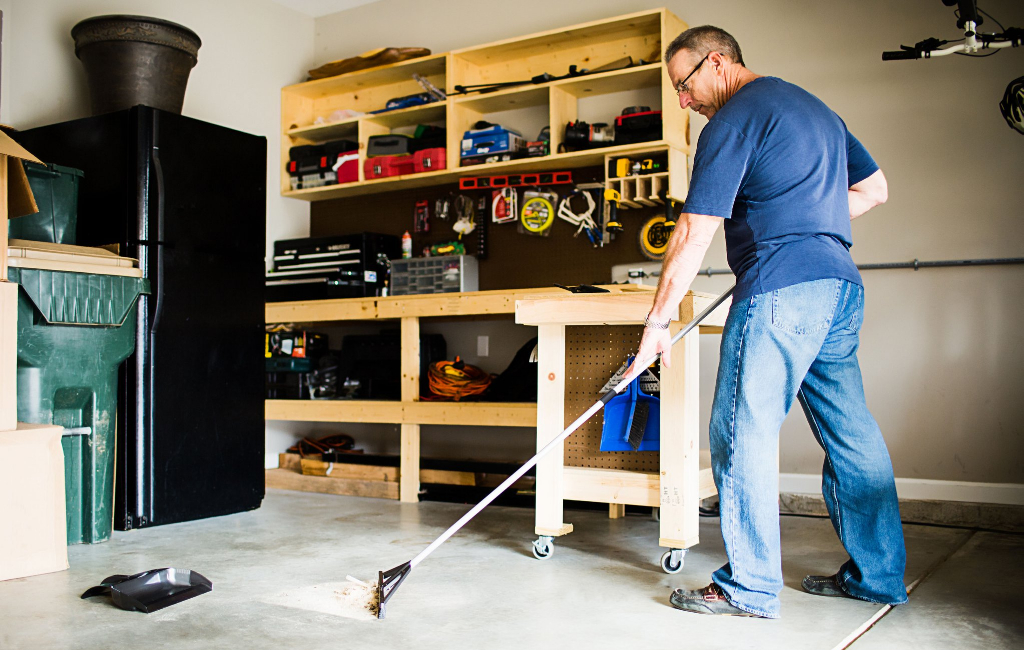 man cleaning garage