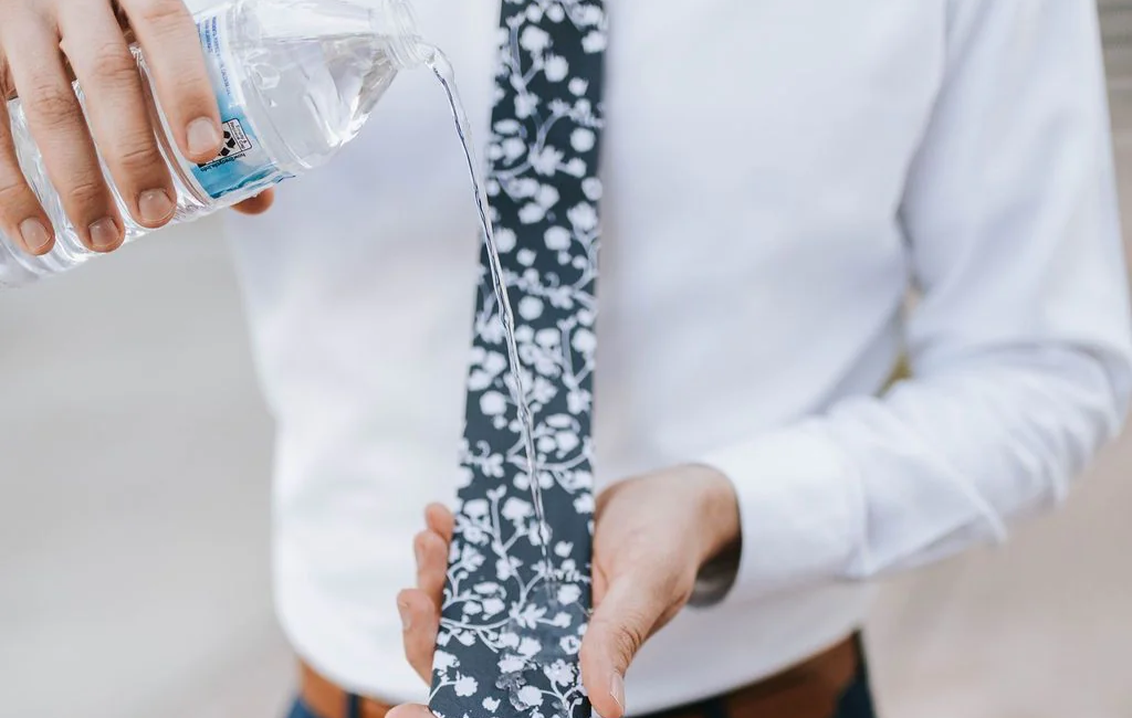 pouring-water-on-tough-tie