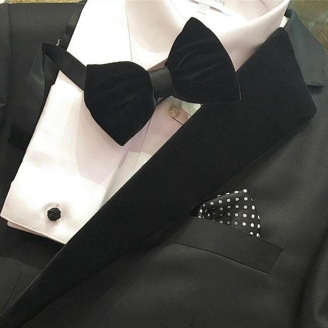 black lapel and bow