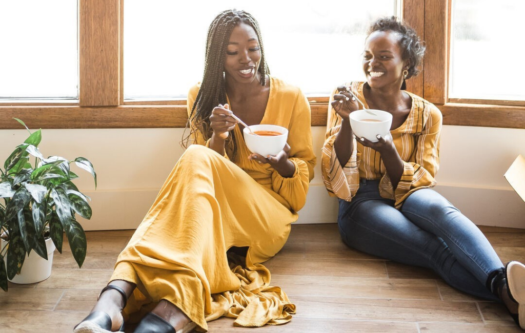 women eating soup