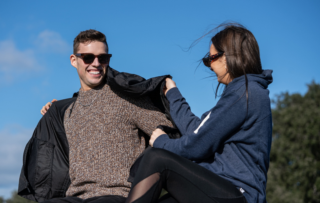 couple wearing hoodies