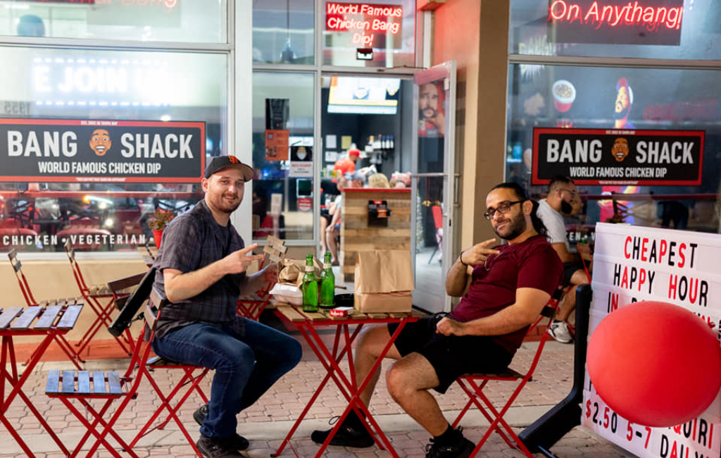 men eating in restaurant