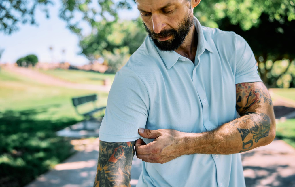 man in sports shirt