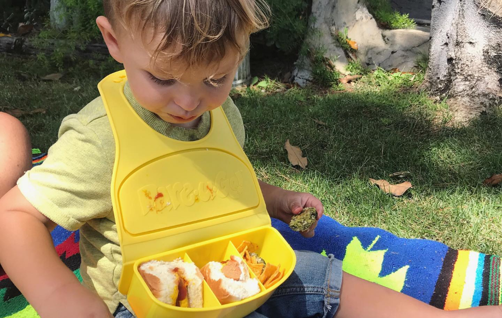 kid wearing bib