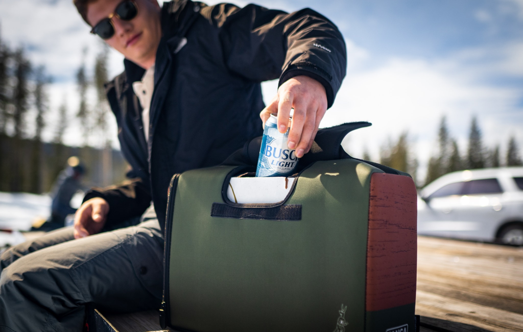 man taking can from bag