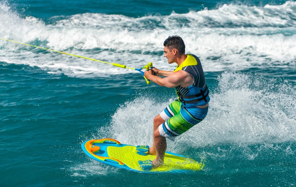 a-man-using-zup-watersports-board-on-water