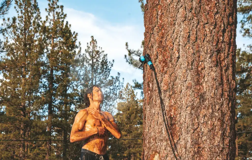 man showering outside