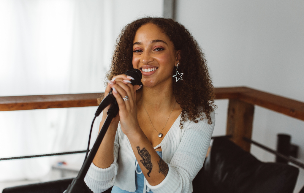 woman holding microphone