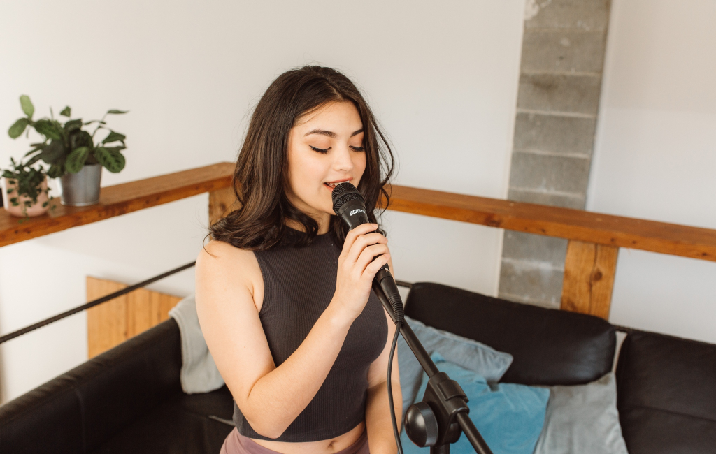 woman holding microphone