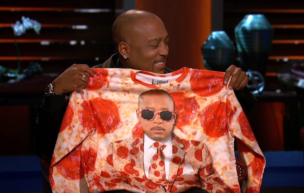 daymond-holding-beloved-shirts