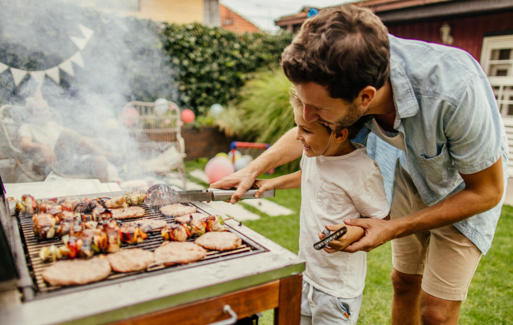 father-and-son-making-bbq