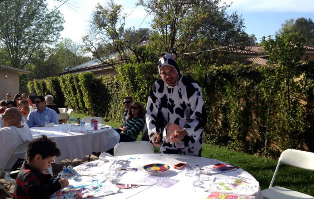 man-in-cow-costume