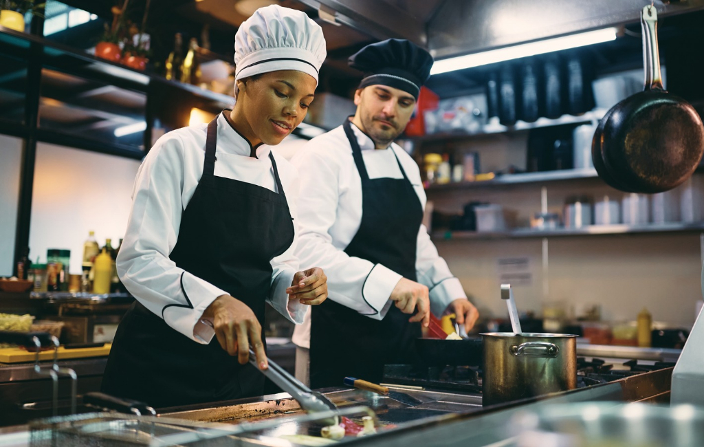 man and woman in kitchen