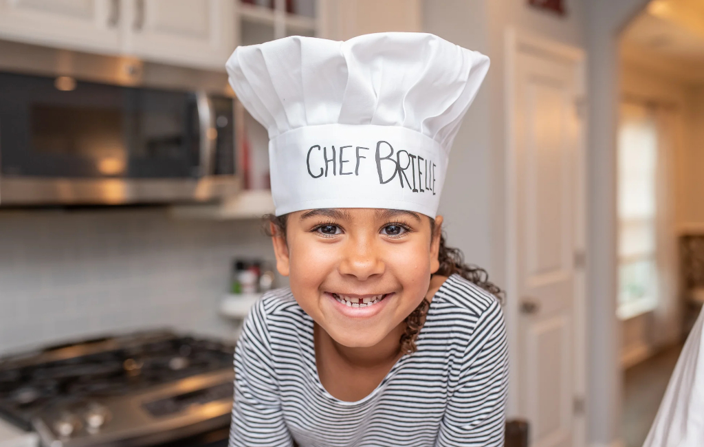 kid with chef cap