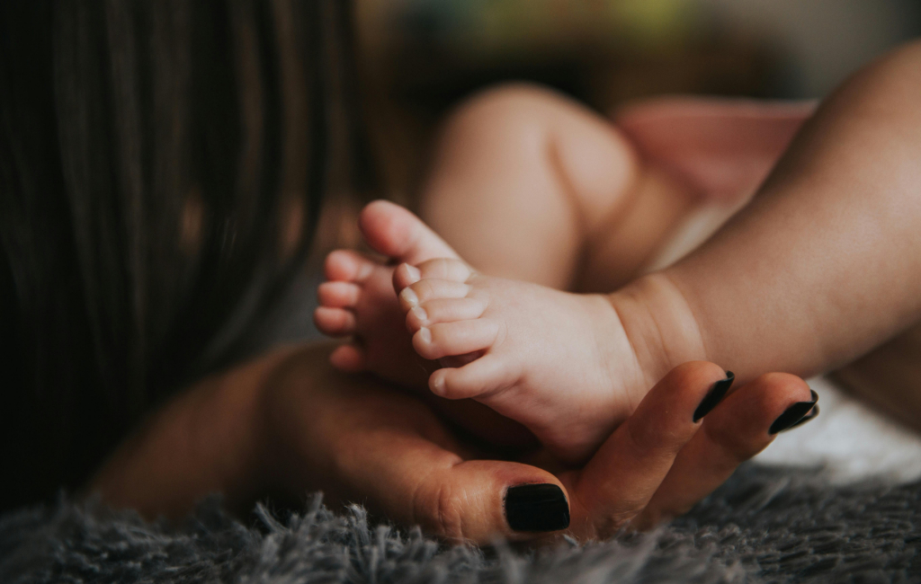 holding-baby-feet